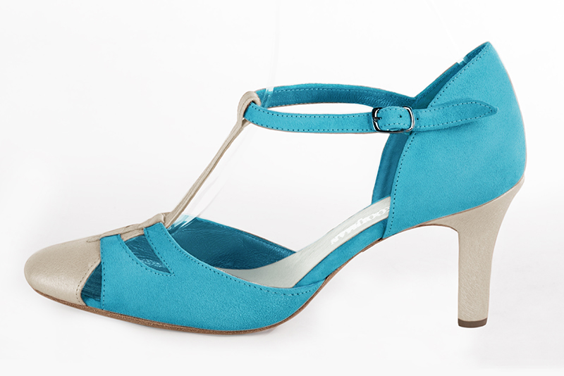 Gold and turquoise blue women's T-strap open side shoes. Round toe. High kitten heels. Profile view - Florence KOOIJMAN